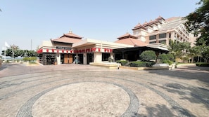 A hotel with a traditional architectural style, featuring a central courtyard with a patterned floor. - Anantara's Sea View / Beach Access / Lagoon Pool (Dubai)