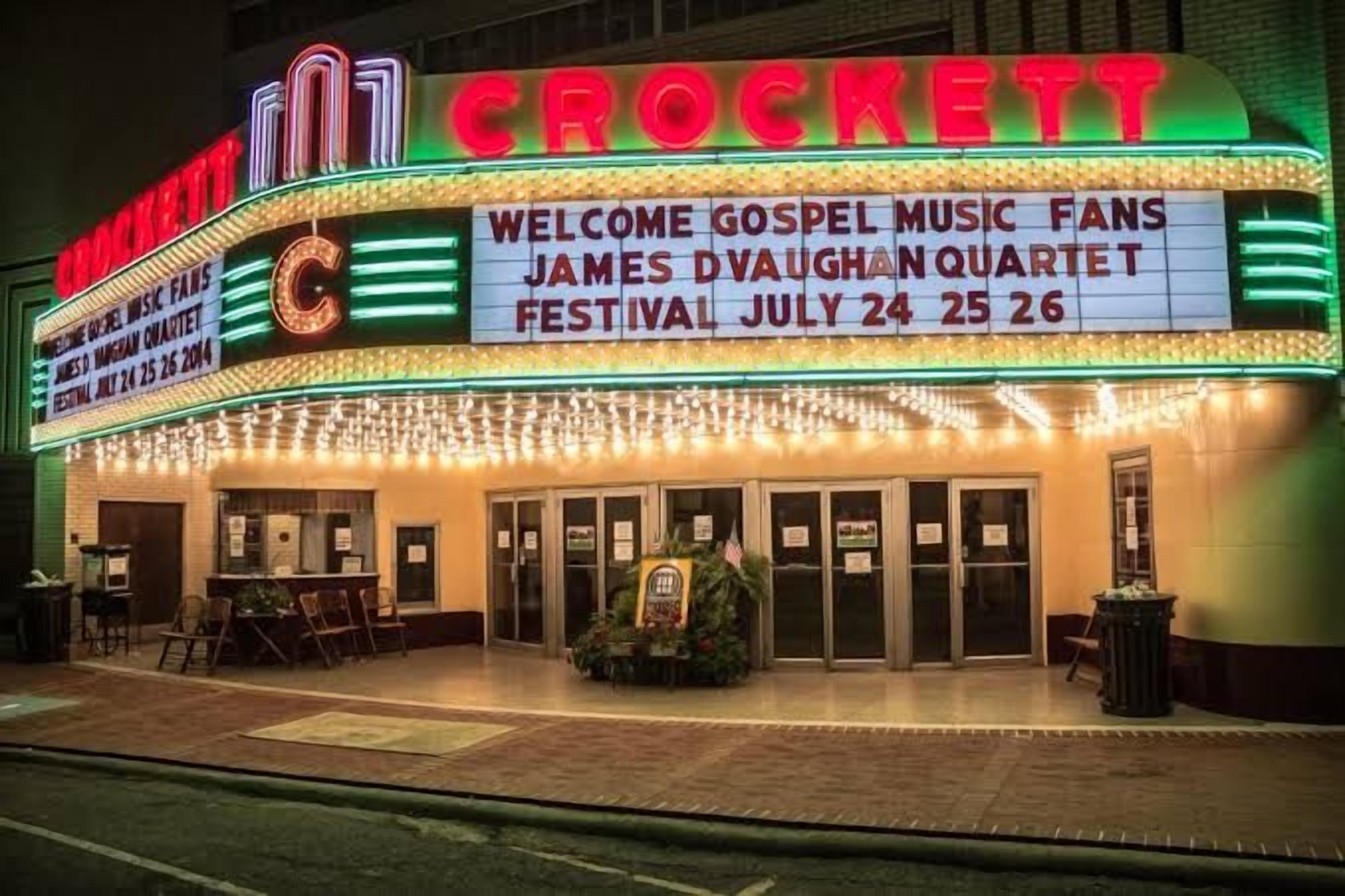 A theater with a marquee advertising a gospel music festival.