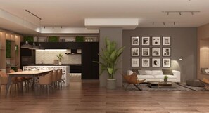 A modern living space with a dining area, a sofa, and a coffee table. - Edificio Parque Vivo by Domus Travels (Santiago)