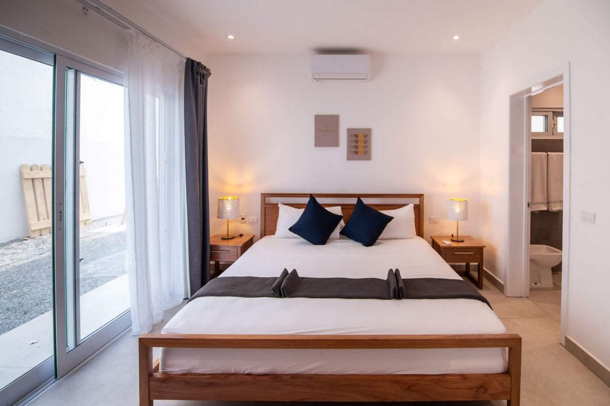 Căn hộ Deluxe, 2 phòng ngủ, máy điều hòa, quang cảnh hồ bơi | Két bảo mật tại phòng, bàn ủi/dụng cụ ủi quần áo 