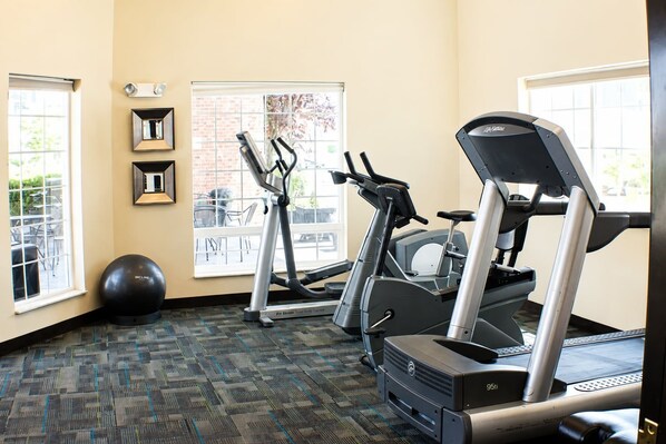 A gym with treadmills, an elliptical, and a stationary bike. - Suite w/ Full Kitchen + Breakfast | Nr Moses Lake (Moses Lake)