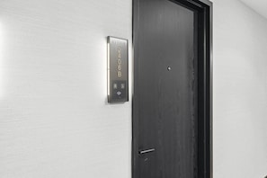 A door with a metallic number plate indicating room number 2406B. - Downtown Miami Studio at E11EVEN | 24th Floor (Miami)