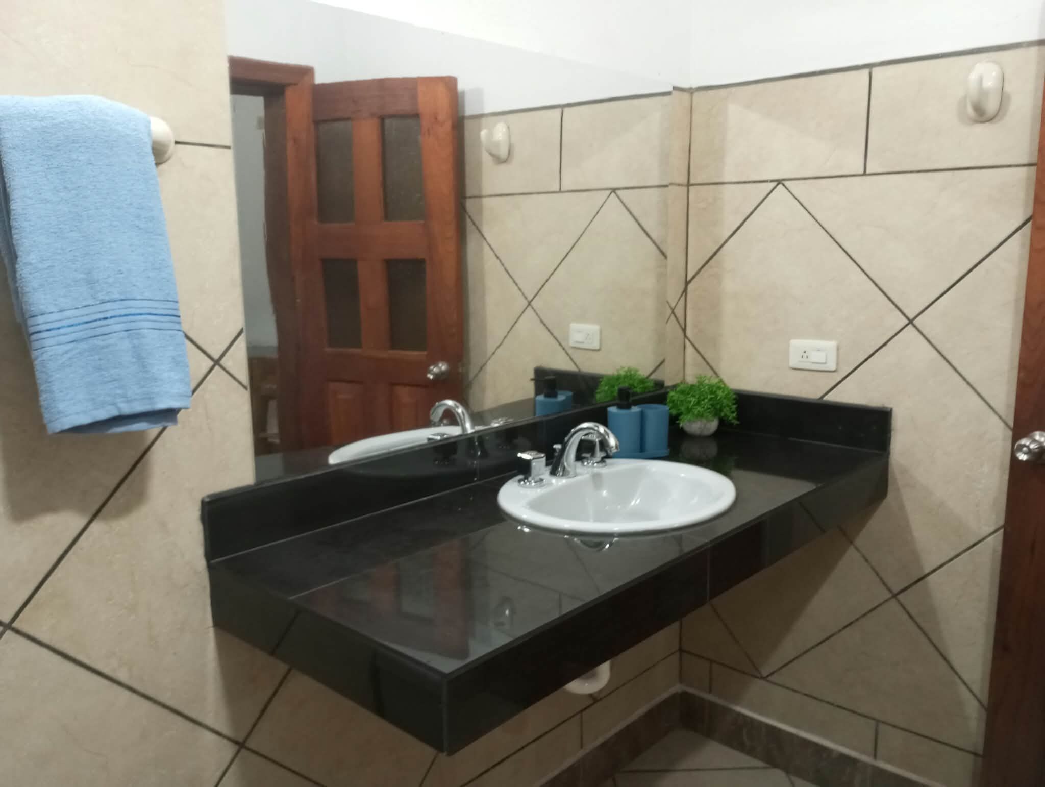 Shower, towels, soap, toilet paper