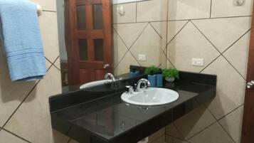 Shower, towels, soap, toilet paper
