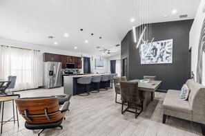 Dining Room & Kitchen - Adventure House - Spacious Disney Escape! Private Pool, Game Room, Modern Design (Kissimmee)