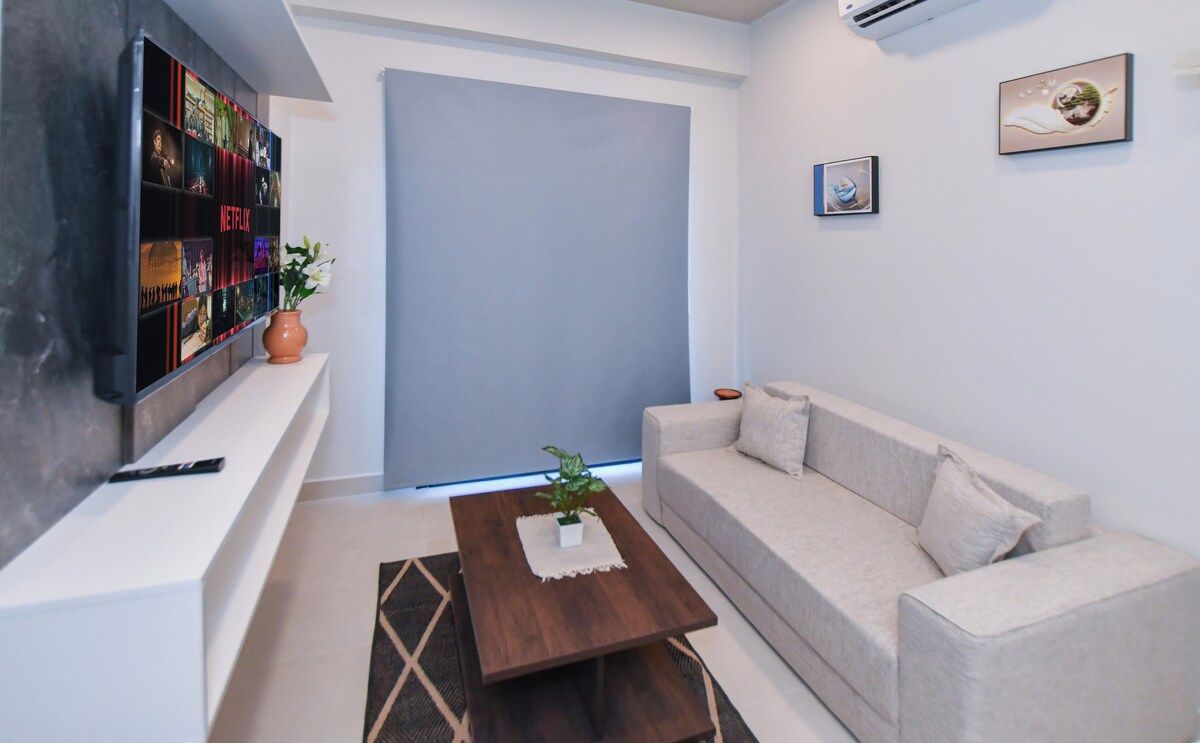 Cozy living room with TV and sofa