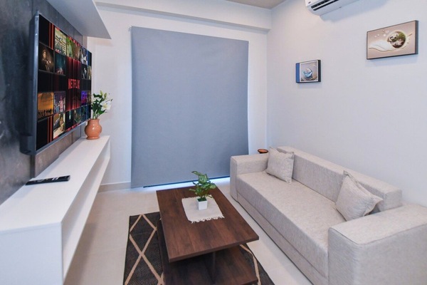 Cozy living room with TV and sofa