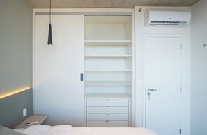 Bedroom closet with shelving - Spacious Stay with Balcony, City Views & Pool BBQ (Asunción)