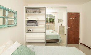 Bedroom closet with folded linens - Modern 1BR Villa Morra with Balcony, BBQ & Parking (Asunción)