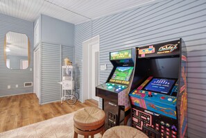Game on, right at home. Two arcade favorites and a popcorn cart set the stage for movie style snacks and a full evening of play with your favorite people. - Fort Walton Fun | Pool, Hot Tub, Games & Firepit (Fort Walton Beach)