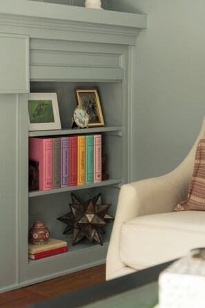 Living Room: A bright and welcoming living room with comfortable seating and a relaxed atmosphere, offering the perfect spot to unwind, chat, or enjoy a quiet evening.