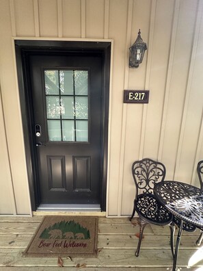 A black door with a window, a mailbox, and a house number sign. - Renovated 2BR Mountain View Condo ½ Mile to Beech Mtn Resort (Beech Mountain)