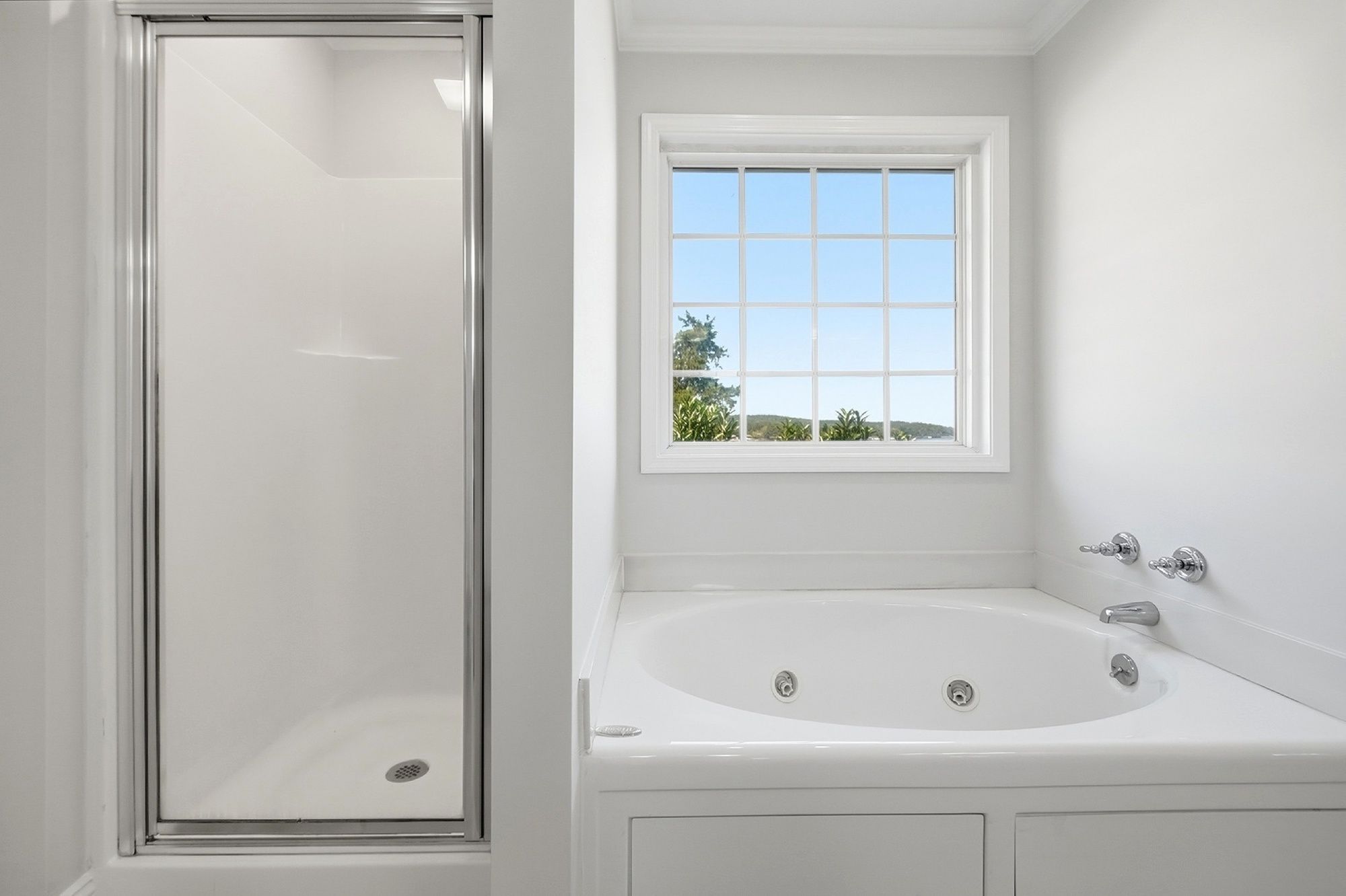 Separate shower + jetted tub for a little post-lake relaxing.