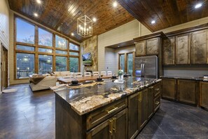 Cook together in a gourmet kitchen that rivals any five-star retreat. - The Cedarwood Collective · Indoor Pool, Theatre, Putt-Putt & Gameroom | Sleeps 27! (Broken Bow)