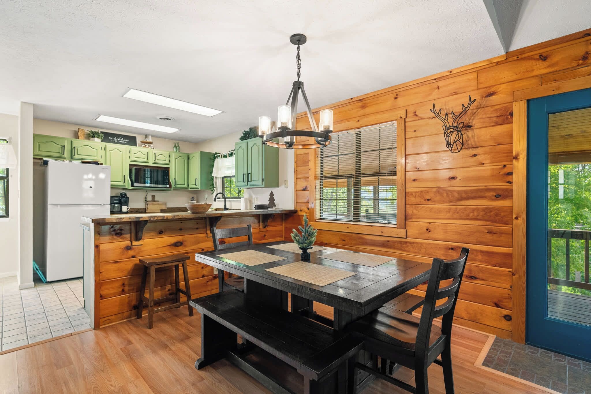 Spacious dining table that flows nicely from the kitchen. 