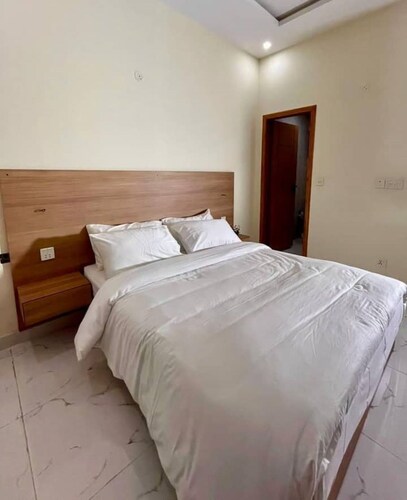 Cozy 2-bedroom apartment in charming Lahore with AC