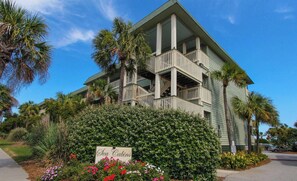 A multi-story building with balconies and a sign reading 'Sea Cabins.' - Oceanfront Condo w/Pool & Fishing Pier! *Unit 337* (Isle Of Palms)