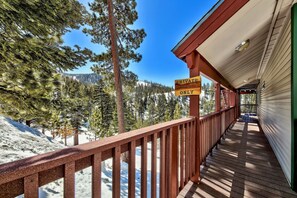 A wooden deck with a sign indicating 'PRIVATE OWNERS & GUESTS ONLY'. - Lake Tahoe 2BR condo with pool, hot tub, lake views, and ski access Mv71 (Stateline)