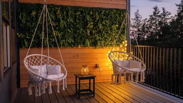 Slip into the private hot tub beneath the covered deck and relax in your own tucked-away outdoor retreat.