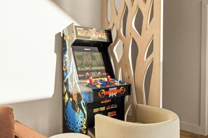 No trip to the arcade required! Challenge the group to a round on the in-home arcade machine whenever the competitive mood strikes.