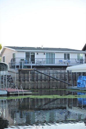 Exterior - This home has 3-bedrooms with a large deck and a boat dock for guests to use. (Clearlake Oaks)