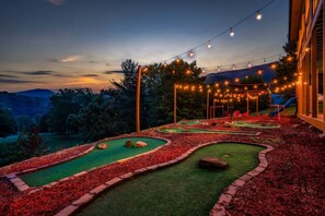 A miniature golf course with a view of mountains in the background. - Mountain View, Pool, Pickleball, Golf & Theater (Sevierville)