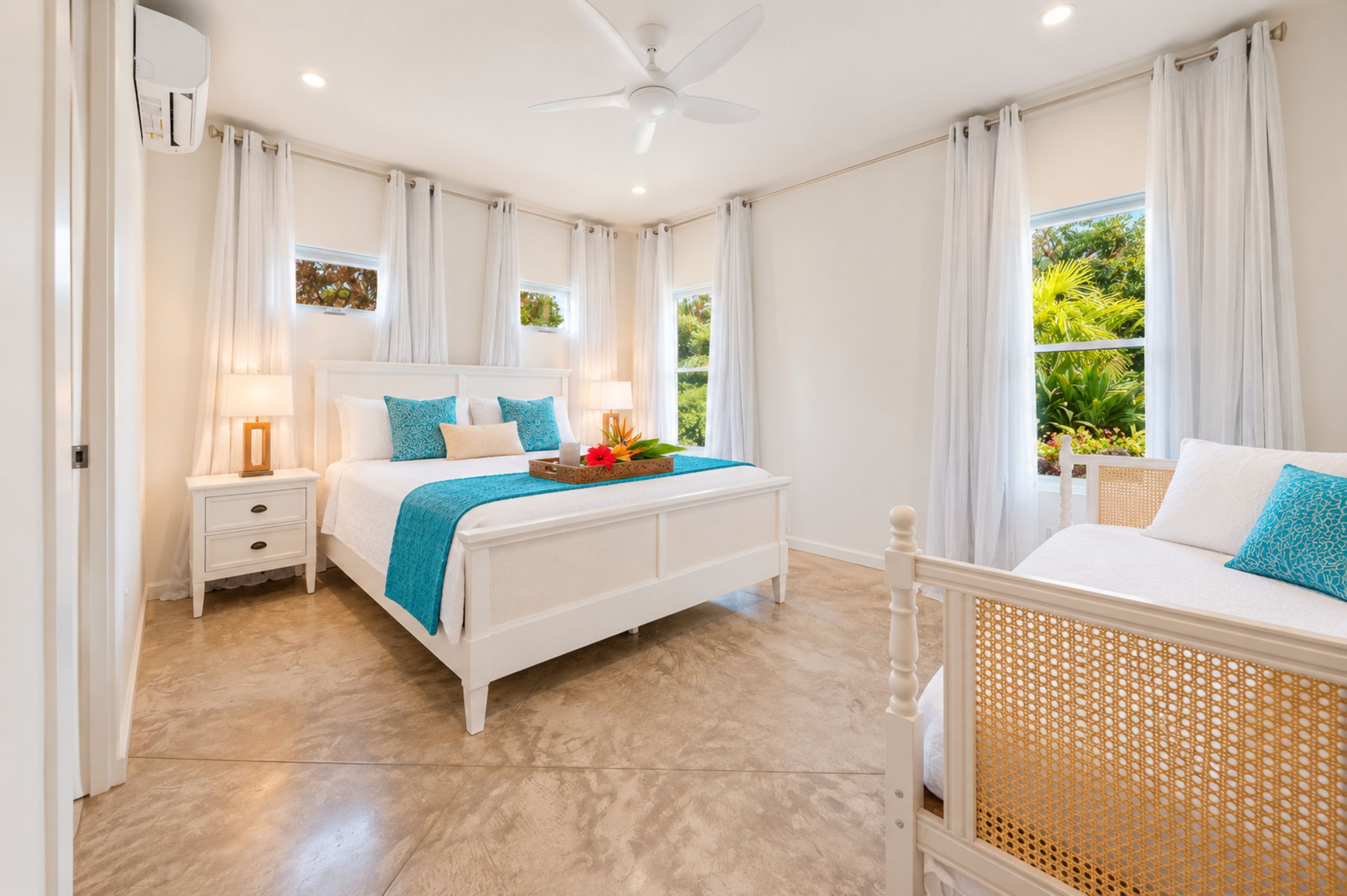 Bedroom 2 — Another view of the spacious master suite with private ensuite bath and AC.