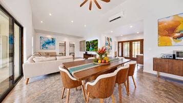 Gather, dine and reconnect in this airy tropical space designed for memorable meals together.