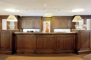 Arrive effortlessly at the polished reception for a smooth welcome.