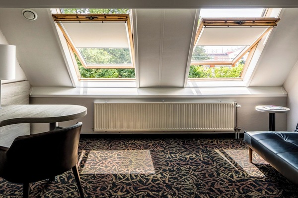 Settle in with a bright workspace and relaxing sofa nook.
