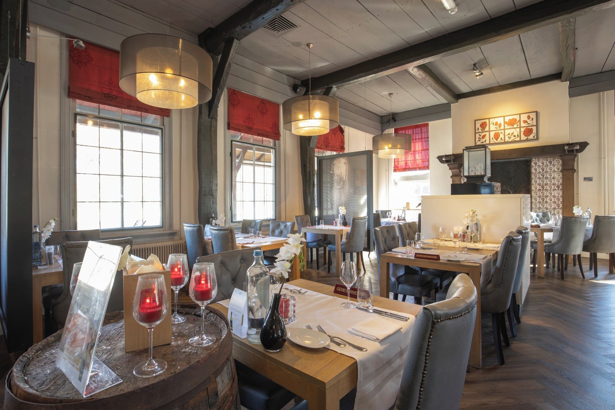 Enjoy intimate table moments with soft light and rustic textures.