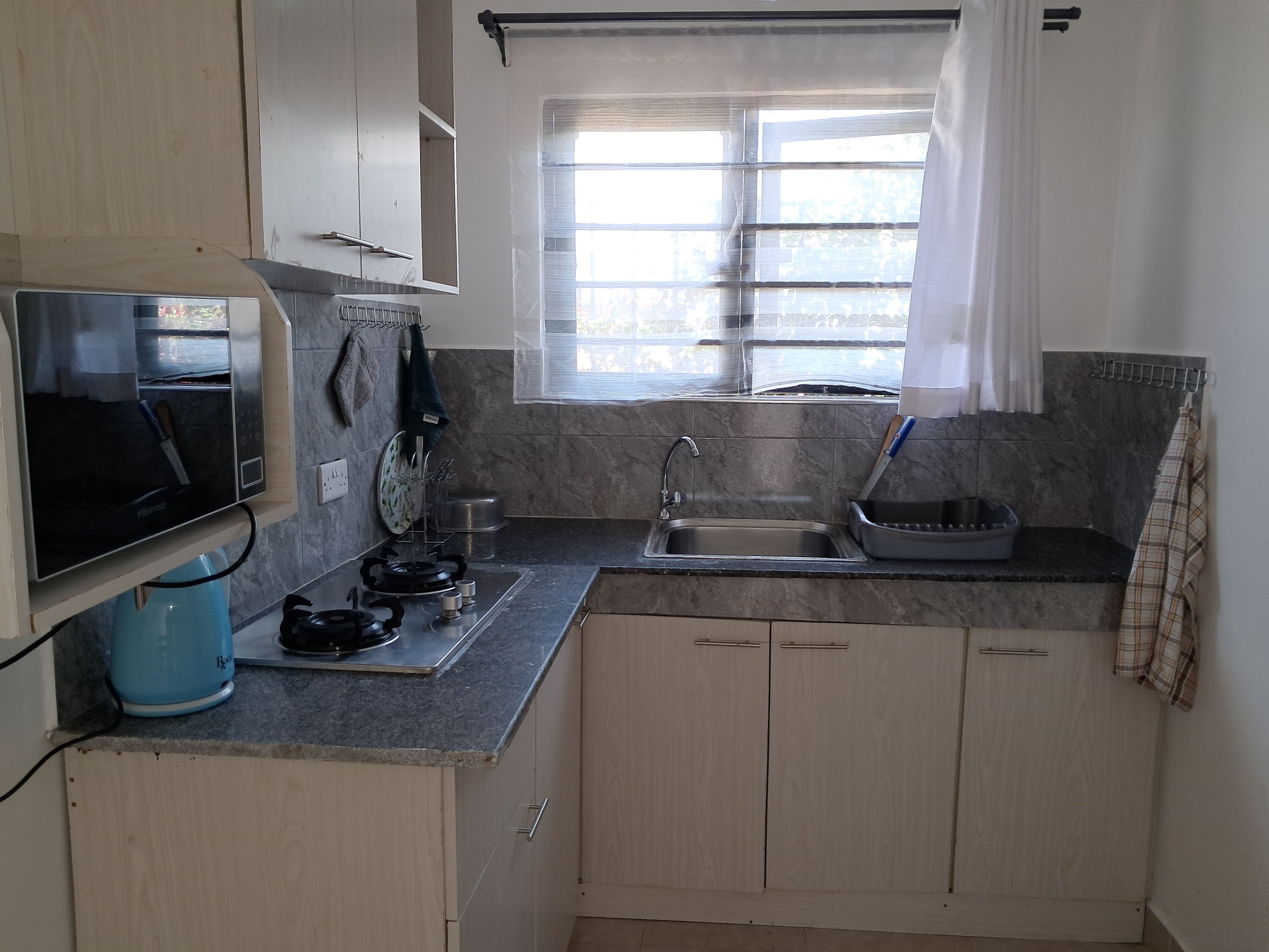 Standard Studio, Garden View | Private kitchen | Shared microwave