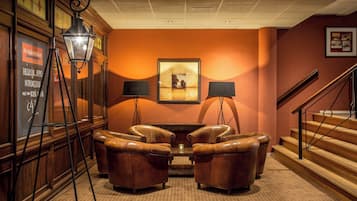 Sip and chat in an intimate corner with warm lighting.