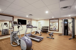 A gym with treadmills, elliptical machines, free weights, and a weight machine. - Staybridge Suites Scottsdale - Talking Stick (Tonopah)