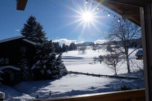 A snowy landscape with a house and trees. - Allgäu Hearts 1 and 2 (Kornau\/Oberstdorf)