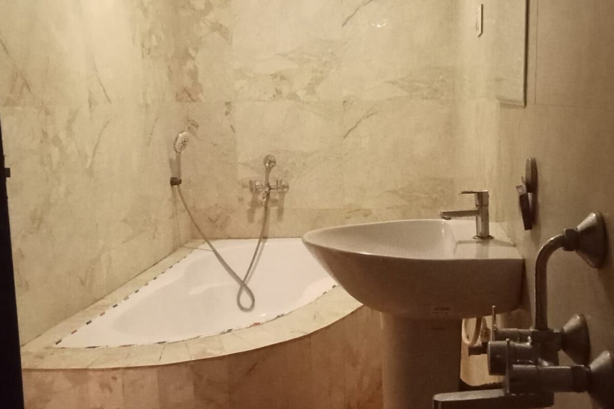 Basic Double Room, Resort View | Bathroom | Shower, free toiletries, towels, soap