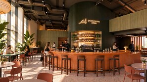 A bar area with a counter, seating, and a sign that reads 'DOCKLANDS LATROPE'. - Docklands LATROUPE (Dublin)