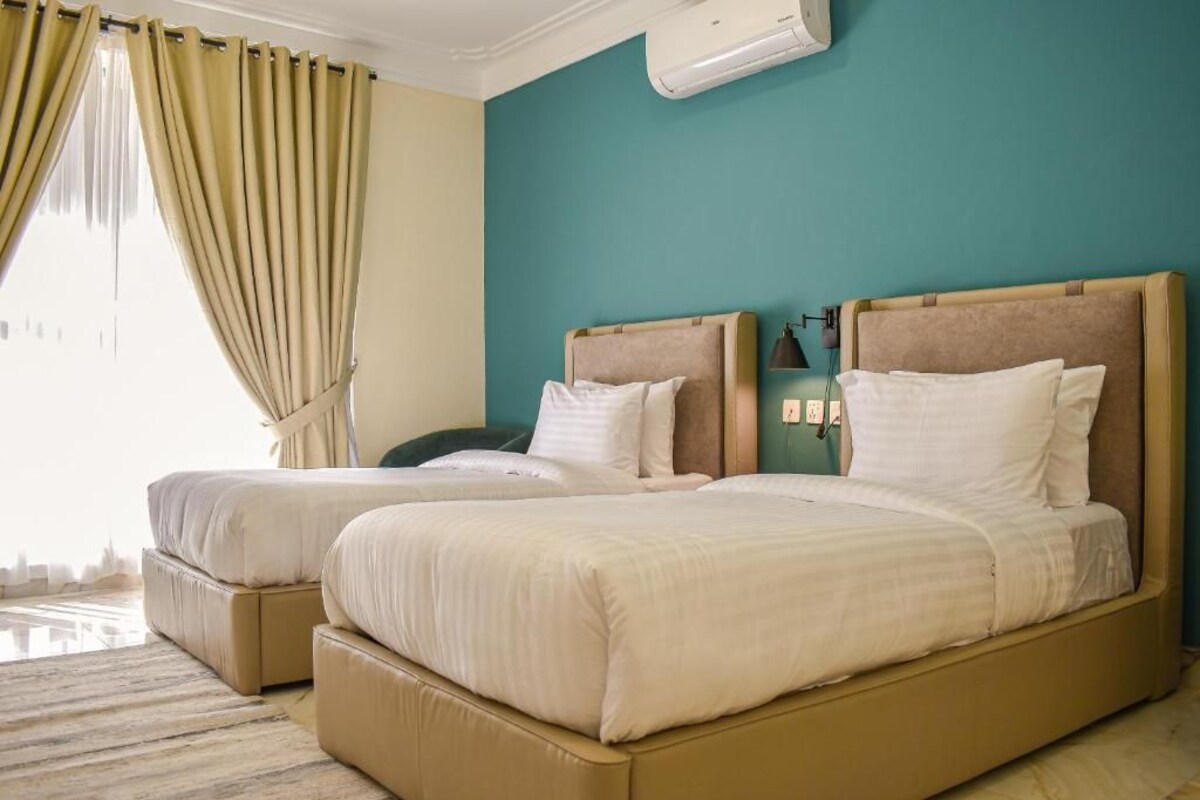 Chambre avec lits jumeaux, vue montagne | Fer et planche à repasser, Wi-Fi gratuit