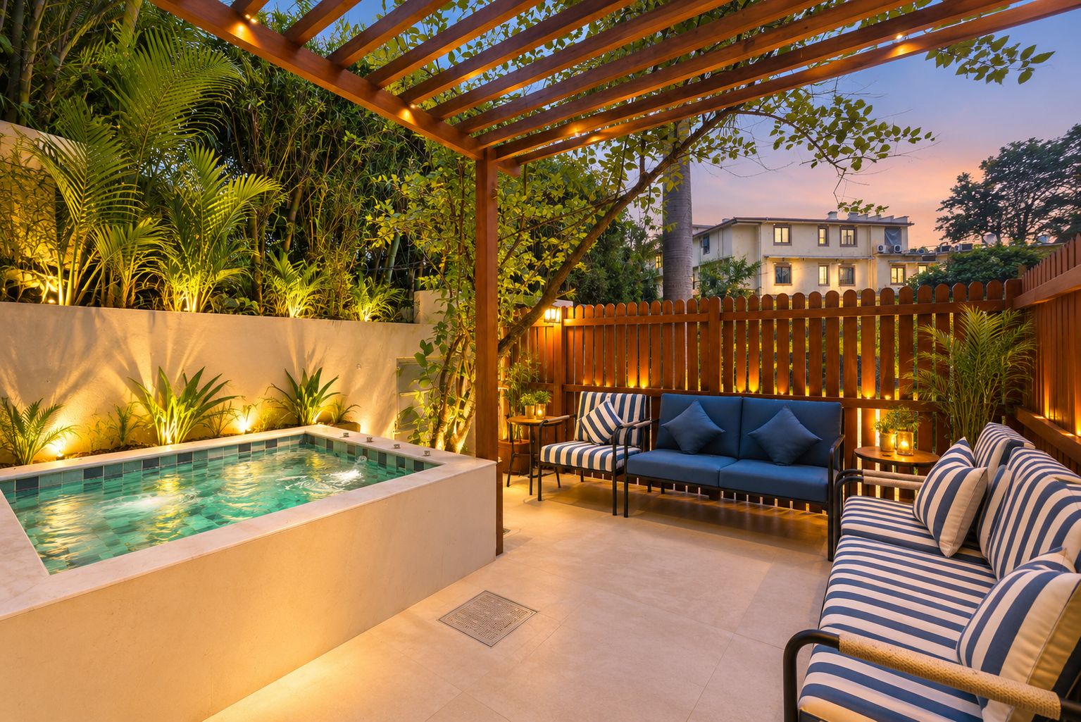 A pool area with a hot tub, lounge chairs, and a wooden pergola.