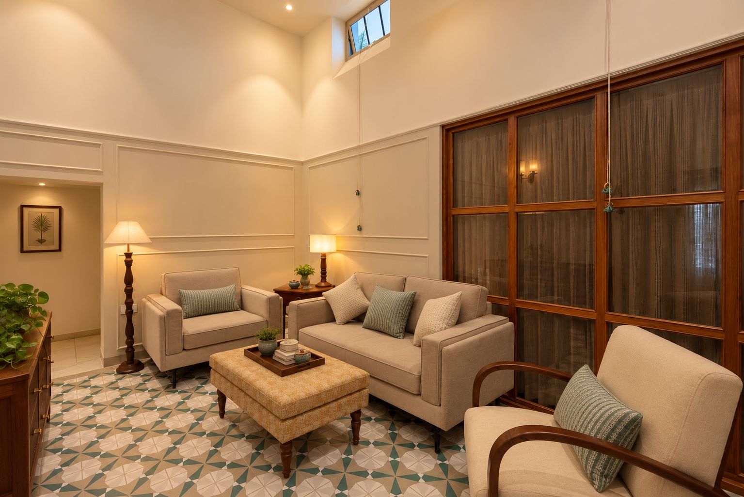A living room with a sofa set, a coffee table, and a large window with curtains.
