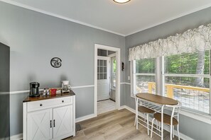 A kitchen with a coffee maker, cabinets, and a window with blinds. - 'country Retreat' Near Wineries & Wedding Venues (Dobson)