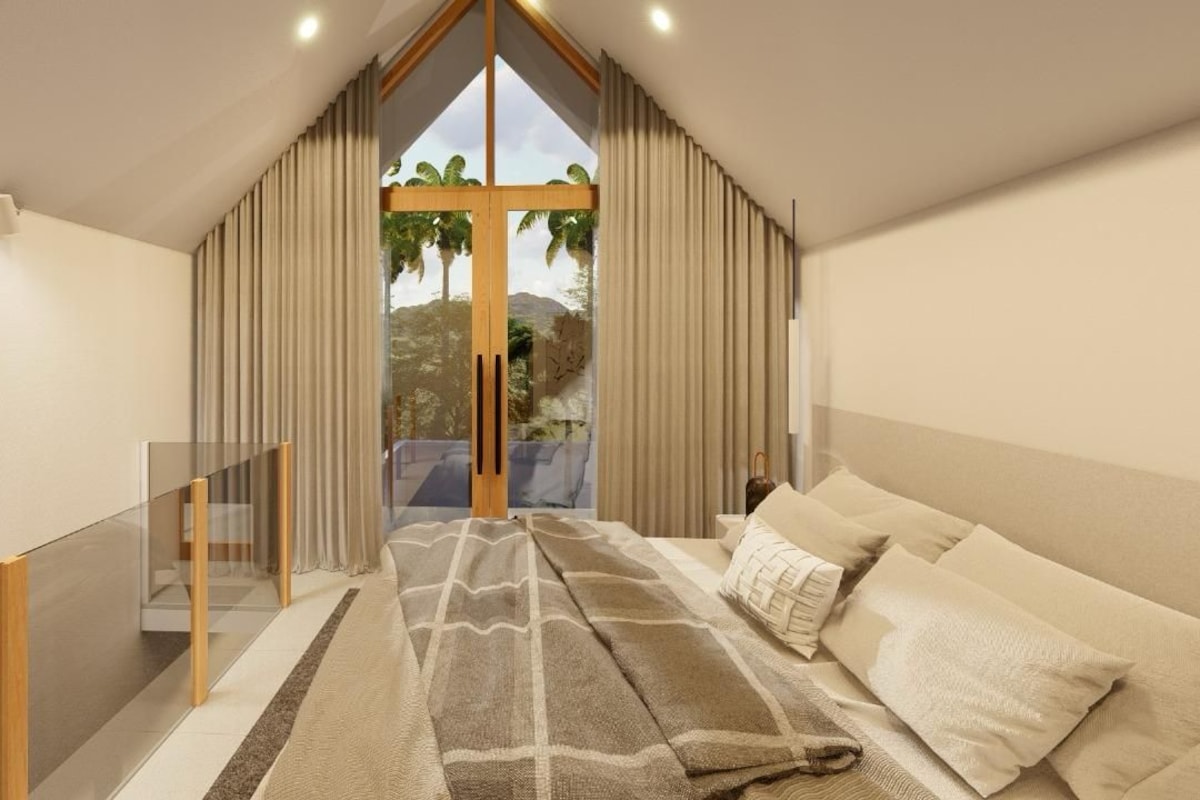 A bedroom with a large window, a bed, a glass partition, and curtains.