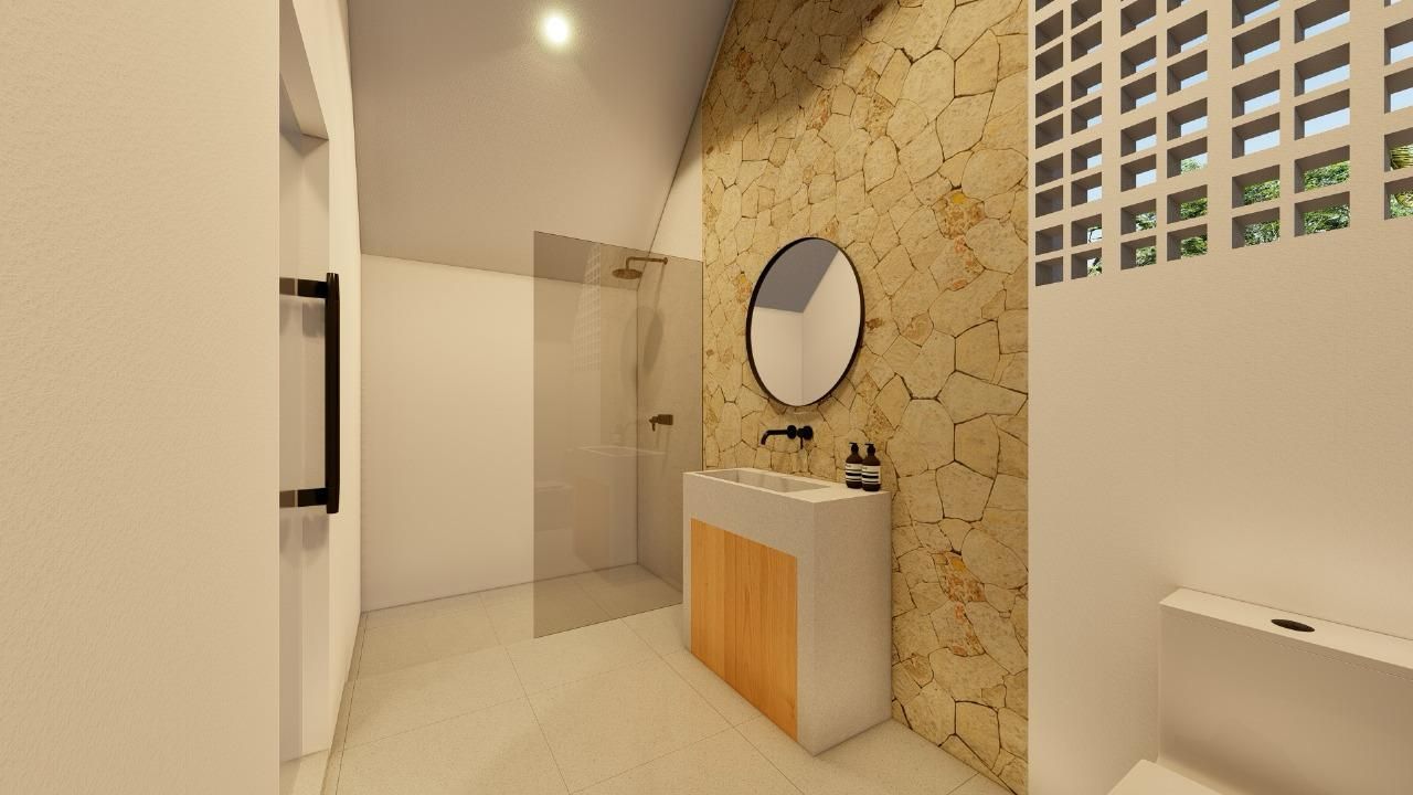Een moderne badkamer met een stenen wand, een ronde spiegel, een houten wastafelmeubel en een douchecabine met glazen wanden.