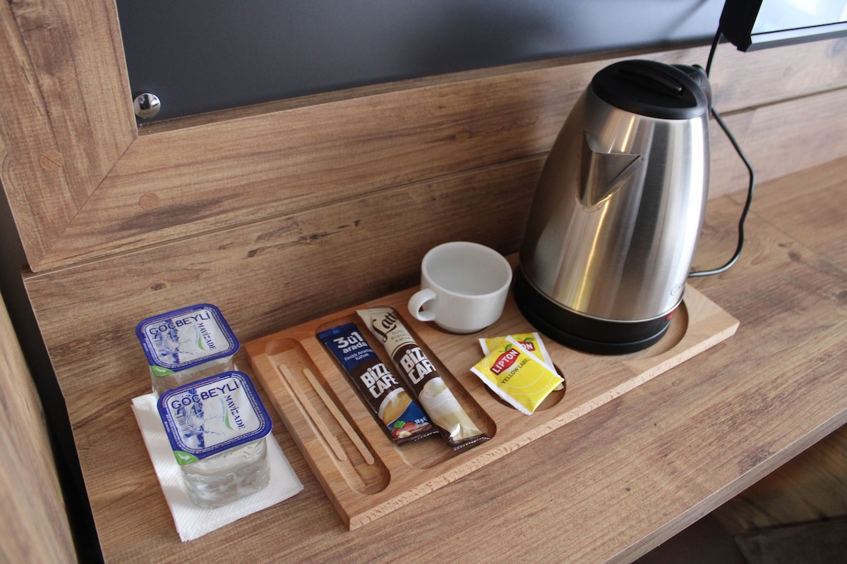 Habitación Deluxe doble de uso individual, vistas a la ciudad | Café o cafetera