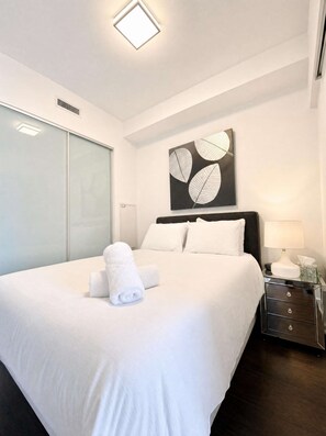 Unclassified image, 2 of 14, button - RivetStays | The Atmos Deluxe Suite – 1 Bedroom Condo (Toronto)