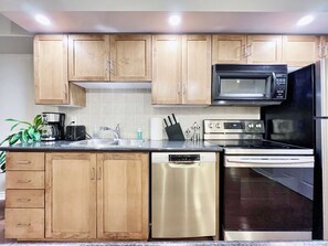 Private kitchen - RivetStays | The Icon Premium Suite - 1 Bedroom + Den Condo (Toronto)
