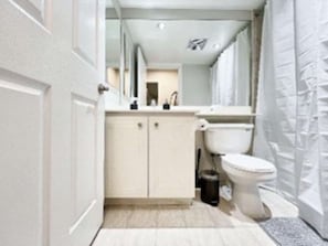 Unclassified image, 3 of 39, button - RivetStays | The Icon Premium Suite - 1 Bedroom + Den Condo (Toronto)