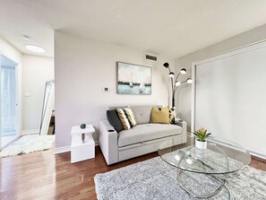 Living area - RivetStays | The Icon Premium Suite - 1 Bedroom + Den Condo (Toronto)