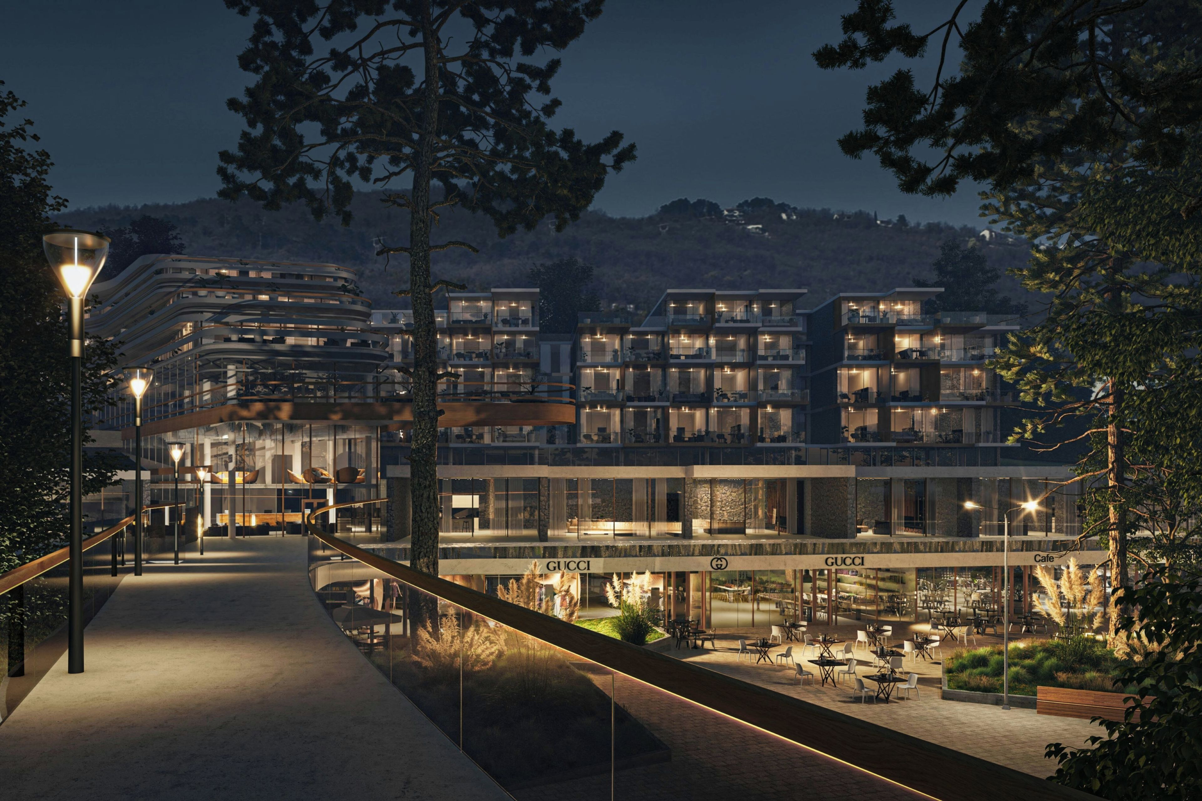 Un hôtel moderne à plusieurs étages, doté d’une terrasse et d’un magasin « GUCCI » bien visible.