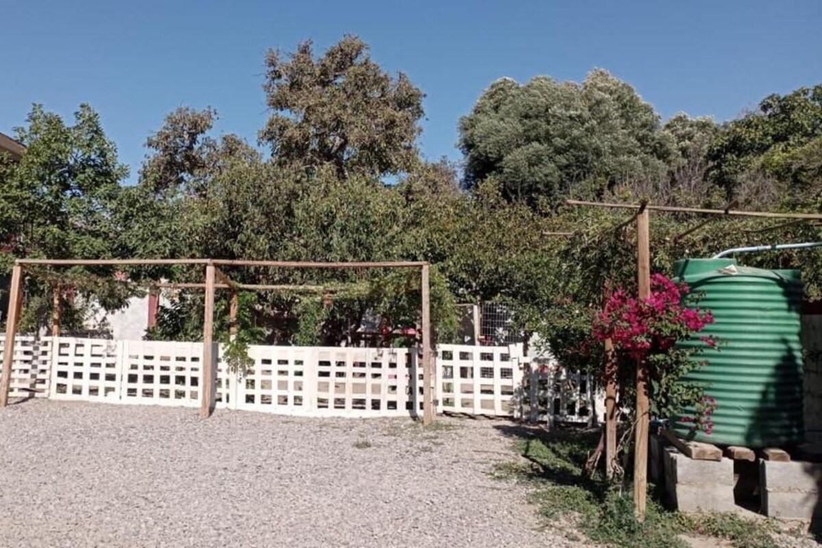 Quarto quádruplo clássico, vista para o jardim | Área da propriedade